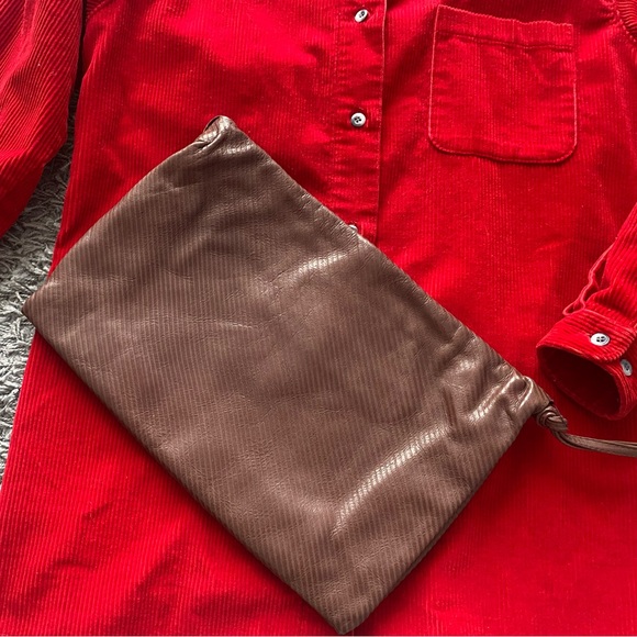 Vintage Handbags - Leather Clutch Paola Del Lungo